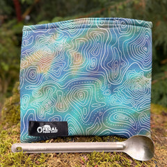 a  teal insulated food cozy 